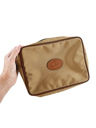 LANCEL PARIS 卡其色尼龍手拿包，搭配棕色 PU 皮革飾邊。