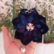Dark blue corsage with high-quality metal-plated branches