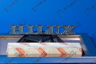 ส่งฟรี ผ่าน Kerry Hilux ตราโลโก้ ติดข้างรถกระบะ Hilux Toyota RN20 RN25 RN27 ของใหม่ เก่าเก็บ สีไม่ลอ