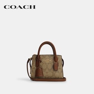 COACH กระเป๋าสะพายข้างรุ่น Andrea Mini Carryall In Signature Canvas CO975 IME74 สีครีม