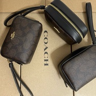 COACH Pouch Wristlet In Signature Canvas