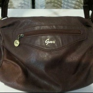 Giamax brown sling bag