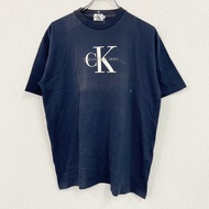 Calvin Klein Jeans短袖印花 T 卹，全新未使用，藏藍色，M 碼（古著）。