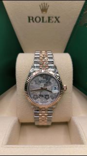 31mm 278271-0032 Oyster Perpetual Datejust 31腕錶永恒玫瑰金及蠔式鋼款，搭配鑲鑽銀色花朵圖案錶面及紀念型（Jubilee）錶帶。