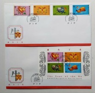 歲次丁丑（1997牛年）郵票及小全張首日封各一個，蓋郵政總局圖案郵戳，封身有微黃