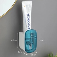 ที่บีบยาสีฟันอัตโนมัติ1ชิ้นอุปกรณ์ในห้องน้ำที่ติดผนังที่บีบยาสีฟันที่วางแปรงสีฟัน