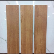 Granit roman ukuran 15x60 motif kayu