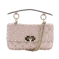 Valentino Rockstud Spike 粉紅小牛皮雙肩包。可斜背、肩背或手提。附有旋鎖。二手。女士款。