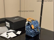 Coach 牛仔香布蕾雙肩包