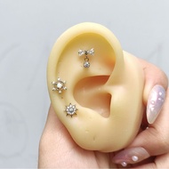 Titanium G23 earrings with dangling bow