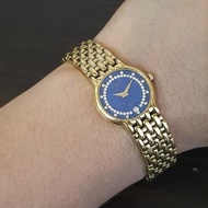 Raymond weil gold watch