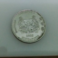 Koin Singapore 20 cents.