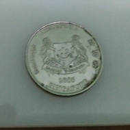 Koin Singapore 20 cents.