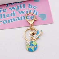 Here is a travel plane metal keychain, double bag jacket