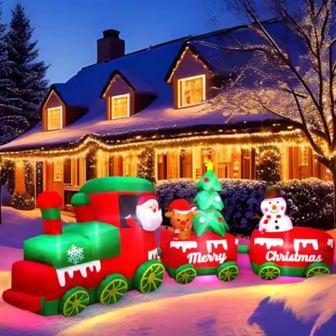 Outdoor Christmas inflatable train with Santa, reindeer, snowman, and trees in red and green; weathe
