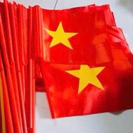 Red flag with yellow star used to take photos and perform school events [Tamkemshop93]