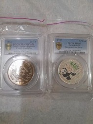 1997年北韓熊貓紀念銀幣及1982年中國紀念銀幣