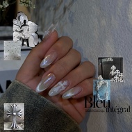 Hand-covered nails, Nailbox with sparkling cat eye design and cross A312