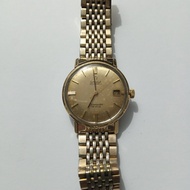 Arloji Omega Seamaster De Ville Automatic, bahan emas , tahun 1969.