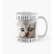 I'm not I'm here live I'm not meme cata Coffee Mug