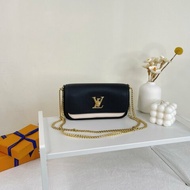 LV LOCKME TENDER POCHETTE
