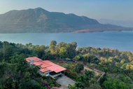 Ekam Lake House by StayVista with Mountain &amp; Lake views, Outdoor jacuzzi, Sauna, Modern amenities &amp; 