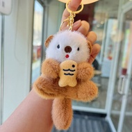 Cute and adorable otter keychain plush toy doll holding a fish otter bag charm keychain doll
