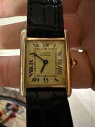 cartier tank must not Rolex not omega