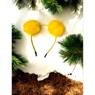 Yellow pom pom iron headband