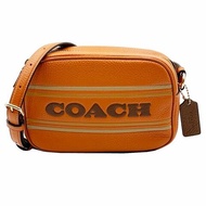 【全新】COACH 字母LOGO素面牛皮斜背小相機包(橘)