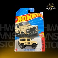 Miniverse - Yellow Hotwheels Land Rover Defender 90 model car