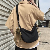 ✁☼ ins แบรนด์อินเทรนด์กระเป๋า Messenger กระเป๋าสะพายชายผ้าแคนวาสหญิงสบาย ๆ All-Match Backpack 2021 ใหม่กระเป๋าผู้ชายญี่ปุ่น
