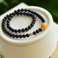 天然和田玉 /和闐玉-墨玉 蜜蠟桶珠純銀四葉設計多圈手串