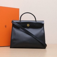 HERMES Herbag31防水帆布89黑色防水帆布/Hunter牛皮U刻金扣肩背包