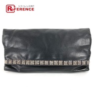 鉻心雙折金字塔鉚釘匕首拉鍊手拿包