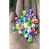 Mute round beads 4 holes retail 50 grams (e)