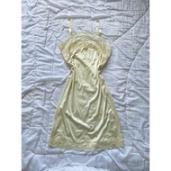 Second-hand thrift 2hand pastel yellow silk nightgown with lace