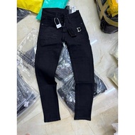 D2 men's jeans with diagonal zipper, black buttons