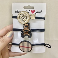 Set of 3 high-quality, super durable, non-slip elastic hair ties with classic charms HT21 G4-10
