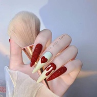 Long red pointed nails