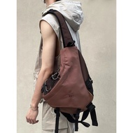 Original Mountain Outdoor Fashion Brand Retro Water Repellent Commuting Cycling Bow and Arrow Crossbody Shoulder Bag