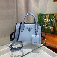 New Female Bag 1BA269 This Double Handle Saffiano Leather Handbag Design Is Perfectly Matched with C