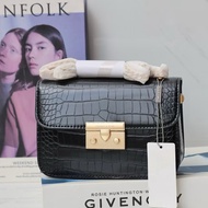 CK patent leather bag