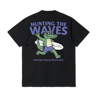 2025 Hunting the Waves themed Black T Shirt with Crocodile Character Surfing and Padang Padang Beach