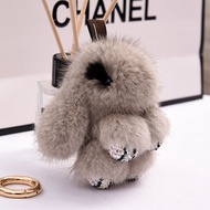 พวงกุญแจตุ๊กตากระต่ายขนาดเล็กตกแต่งรถ Ferret Fur น่ารัก จี้กระเป๋ากระต่ายจี้ ผู้หญิง เครื่องประดับแฟ