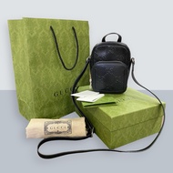 Authentic Gucci GG Embossed Black Leather Mini Sling Bag