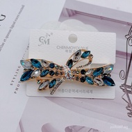 Fenmo Yuyue's new design features a small elastic clip and a playful bow hair accessory 4D2M