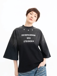 Pania Ixora Text Tee in Rusty Wash Black แพนญาเสื้อยืดลายอักษรรุ่นอิกซอร่าสีดำฟอก