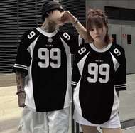 Black and white 49ers jerseys with number 99 for couples. Casual streetwear. Urban setting.