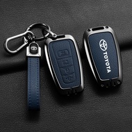ที่ครอบเคสกุญแจรถยนต์หนังแท้โลหะผสมสังกะสีปลอกหุ้มพวงกุญแจรีโมทรถยนต์อัจฉริยะป้องกันด้วยปุ่มสำหรับ T